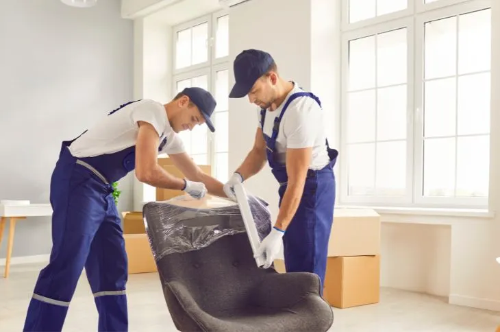 Movers are packing furniture